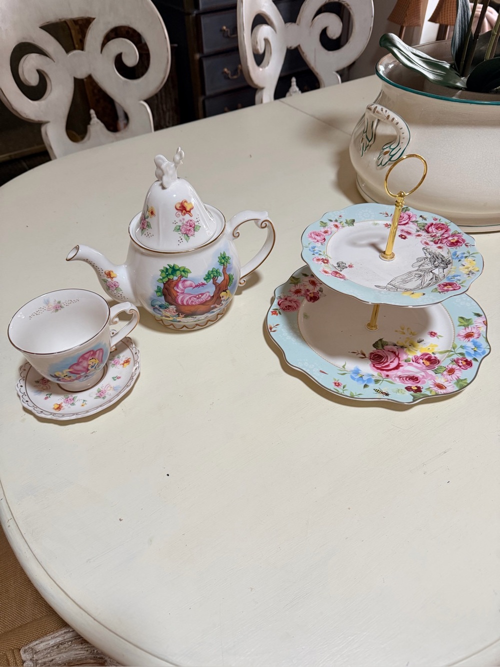 Disney Alice in wonderland tea pot cup and  saucer.